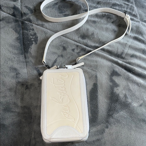 Christian Louboutin Handbags - Preloved Christian Louboutin phone bag crossbody white excellent 7.5”L X 4.5”W
